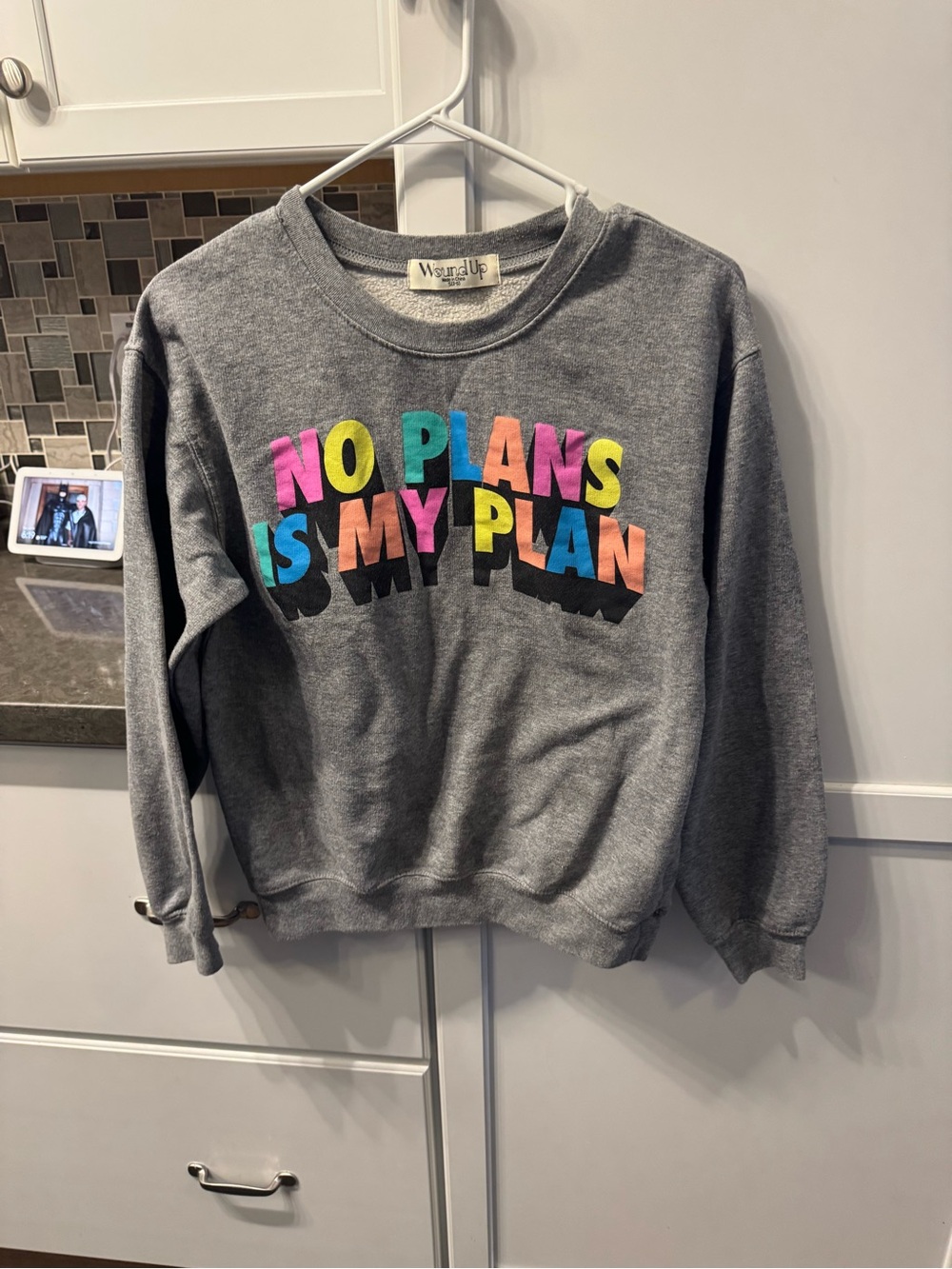 Wound Up Gray Sweatshirt with Bright Multicolor Lettering